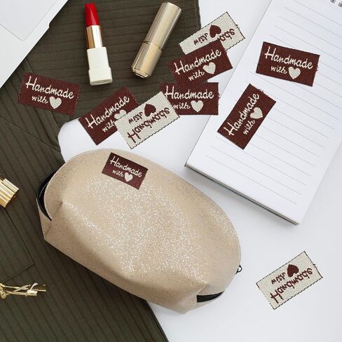 Jeffdad 100 قطعة من ملصقات الخياطة للمنتجات المصنوعة يدويًا، مصنوعة يدويًا بملصقات الحب وعلامات منقوشة على الملابس، ملصقات قماشية للحرف اليدوية والحياكة والخياطة الكروشيه (بني عميق) in Kuwait