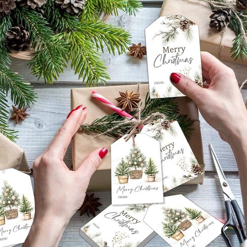 50pcs Christmas Gift Tags Merry Christmas Paper Gift Tags with String Watercolor Xmas Tree Pinecone Hanging Labels Gift Wrapping Tags for Christmas Winter Holidays DIY Party Favor Decor in Saudi Arabia