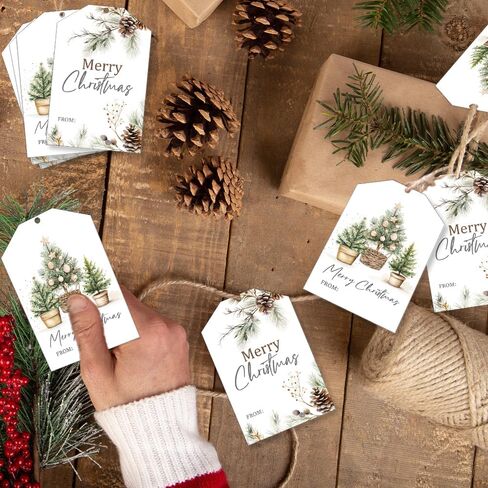 50pcs Christmas Gift Tags Merry Christmas Paper Gift Tags with String Watercolor Xmas Tree Pinecone Hanging Labels Gift Wrapping Tags for Christmas Winter Holidays DIY Party Favor Decor in Saudi Arabia