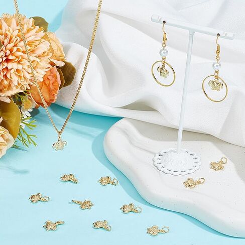 Beebeecraft 1 Box 18K Gold Plated Dinosaur/Snail/Ladybug/Swan/Paw Print/Mask Charms for Bracelet Necklace Jewelry Making in Saudi Arabia