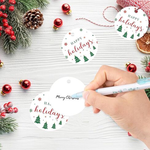 G2PLUS Happy Holiday Tags, 100PCS Christmas Holiday Tags, 2'' Round Holiday Gift Tags, Christmas Tree Paper Gift Tags with String for Xmas Gift Wrapping, DIY Arts & Crafts, Holiday Season Party Favors in Saudi Arabia