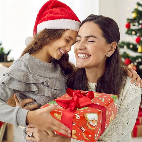 ورق تغليف عيد الميلاد من AUCLAY للأطفال الأولاد والبنات والأطفال - 8 أوراق كبيرة من ورق تغليف هدايا عيد الميلاد مع سانتا اللطيفة وكسارة البندق وخبز الزنجبيل وتصميم جنوم - مسطحة مطوية، 27 بوصة × 37 بوصة لكل ورقة in Saudi Arabia
