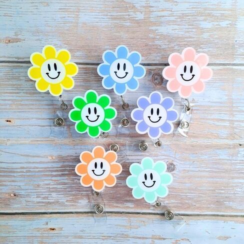 7 قطع من بكرة شارة الوجه المبتسم على شكل زهرة قابلة للسحب للممرضة والمعلم؛ لطيف عباد الشمس ديزي معرف اسم حامل بطاقة التعريف ممرضات الأطفال التمريض بكرات مقاطع الحبل اكسسوارات هدايا الطلاب in Kuwait