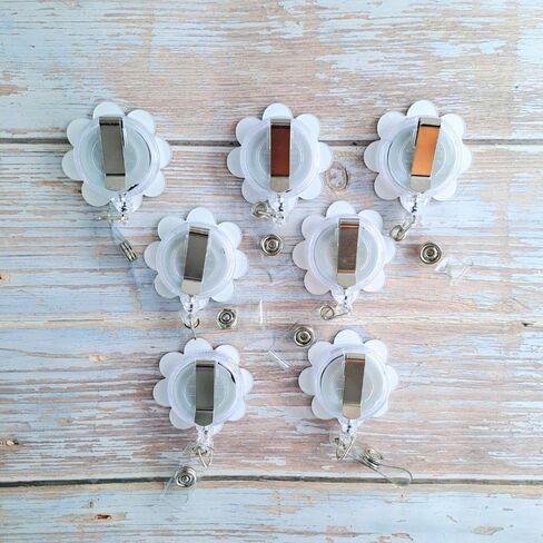 7 قطع من بكرة شارة الوجه المبتسم على شكل زهرة قابلة للسحب للممرضة والمعلم؛ لطيف عباد الشمس ديزي معرف اسم حامل بطاقة التعريف ممرضات الأطفال التمريض بكرات مقاطع الحبل اكسسوارات هدايا الطلاب in Kuwait