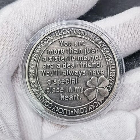 عملة فضية قديمة محظوظة مع فراشة وبرسيم بأربع أوراق للأخت العزيزة in Kuwait