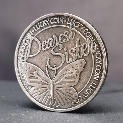 عملة فضية قديمة محظوظة مع فراشة وبرسيم بأربع أوراق للأخت العزيزة in Kuwait