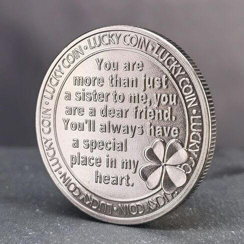 عملة فضية قديمة محظوظة مع فراشة وبرسيم بأربع أوراق للأخت العزيزة in Kuwait