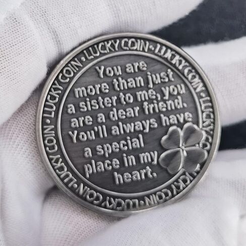 عملة فضية قديمة محظوظة مع فراشة وبرسيم بأربع أوراق للأخت العزيزة in Kuwait