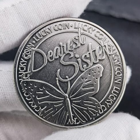 عملة فضية قديمة محظوظة مع فراشة وبرسيم بأربع أوراق للأخت العزيزة in Kuwait