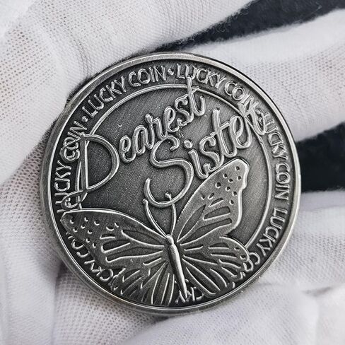 عملة فضية قديمة محظوظة مع فراشة وبرسيم بأربع أوراق للأخت العزيزة in Kuwait