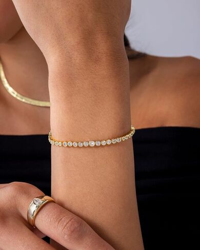 PAVOI 14K Gold Plated Cubic Zirconia Bezel Set Tennis Bracelets for Women | Fashion Round Heart Radiant Cut Trinity Stones Gold Bracelet | Sizes 6.5-7.5 Inch in Saudi Arabia