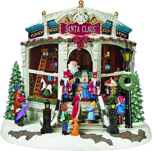 Christmas Village Building, Santa's Toy Shop with Christmas Music, LED Lights, and Animation - Power Adapter (Included) (15.35" H x 16.5" W x 15.2" D) by Moments in Time in Saudi Arabia