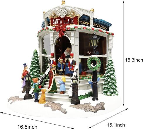 Christmas Village Building, Santa's Toy Shop with Christmas Music, LED Lights, and Animation - Power Adapter (Included) (15.35" H x 16.5" W x 15.2" D) by Moments in Time in Saudi Arabia