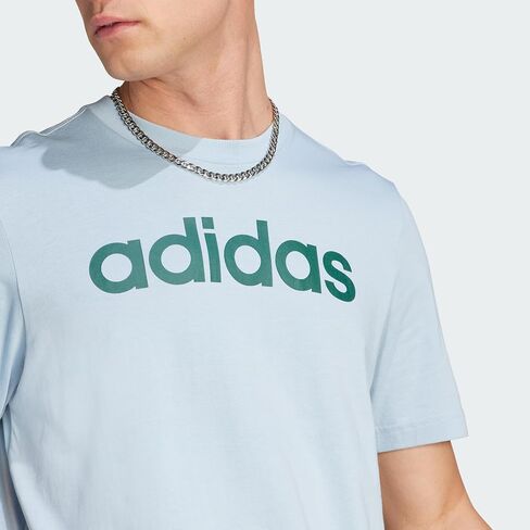 قميص adidas Essentials الرجالي ذو الجيرسيه الخطي المطرز بشعار T in Saudi Arabia
