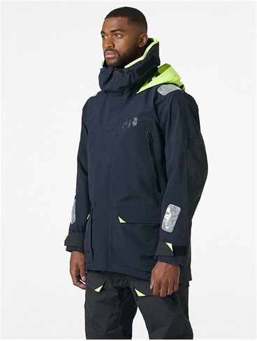 سترات Helly-Hansen Skagen المقاومة للماء للرجال تتميز بنسيج إبحار مقاوم للرياح وغطاء رأس أصفر نيون قابل للتعبئة، GOLD RUSH - متوسط in Saudi Arabia