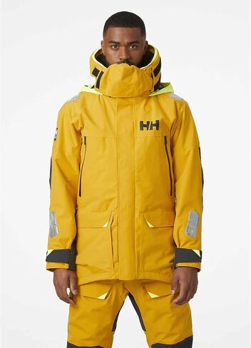سترات Helly-Hansen Skagen المقاومة للماء للرجال تتميز بنسيج إبحار مقاوم للرياح وغطاء رأس أصفر نيون قابل للتعبئة، GOLD RUSH - متوسط in Saudi Arabia