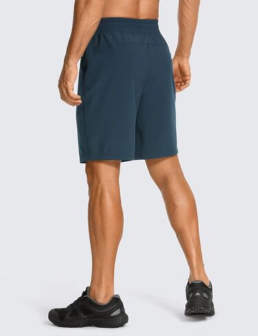 شورت رجالي للتمرين بدون بطانة من CRZ YOGA - شورت رياضي للجري سريع الجفاف مقاس 7 بوصات مع جيوب in Kuwait