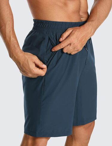 شورت رجالي للتمرين بدون بطانة من CRZ YOGA - شورت رياضي للجري سريع الجفاف مقاس 7 بوصات مع جيوب in Kuwait