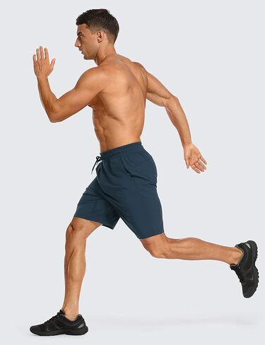 شورت رجالي للتمرين بدون بطانة من CRZ YOGA - شورت رياضي للجري سريع الجفاف مقاس 7 بوصات مع جيوب in Kuwait