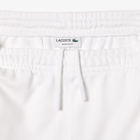 شورت Lacoste للرجال ذو مقاس عادي وخصر قابل للتعديل مع رسمة تمساح متوسطة بالقرب من الجزء السفلي من الساق in Saudi Arabia