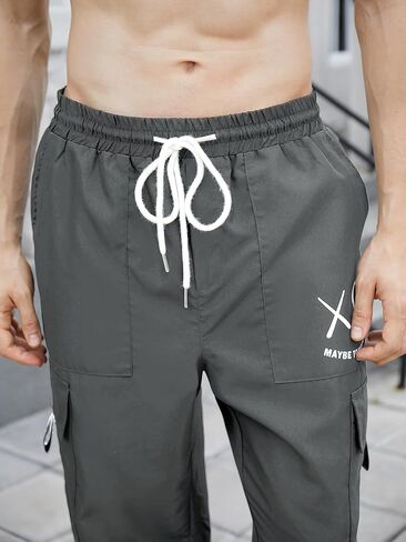 OYOANGLE Men's Cargo Pants Drawstring Elastic Waist Flap Pocket Casual Street Pants in Saudi Arabia