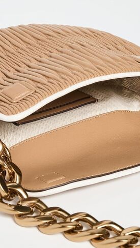 Tory Burch Women's Fleming Soft Pleated Mini Crescent Bag in Saudi Arabia