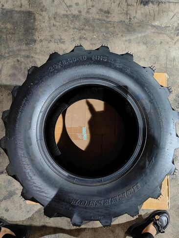 HORSESHOE 12-16.5 14 PLY جرافة انزلاقية التوجيه بدون أنابيب مع واقي حافة للخدمة الشاقة G تحميل 12x16.5 305/70-16.5 NHS SKS1 L2/G2 T168 in Kuwait