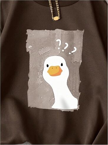 WDIRARA Women's Cartoon Duck Printed Crew Neck Sweatshirt Graphic Long Sleeve Loose Pullover in Saudi Arabia