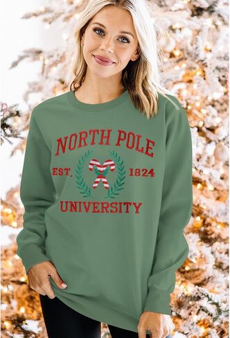 IZYJOY Christmas North Pole University Sweatshirt Women Xmas Candy Embroidered Shirt Crewneck Oversized Holiday Pullover Top in Saudi Arabia