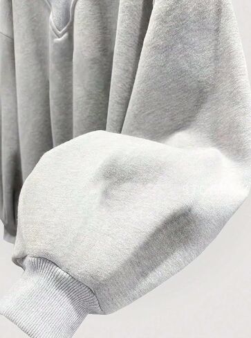 سويت شيرت نسائي كبير الحجم برقبة على شكل V من LovelyWholesale، قمصان بأكمام طويلة وأكتاف منسدلة in Kuwait