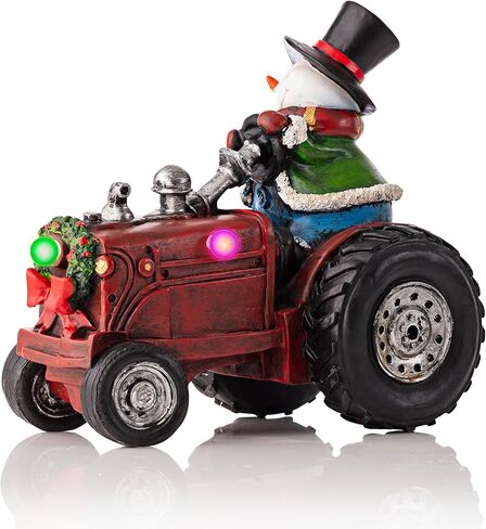 شركة Alpine Corporation 9 بوصة ارتفاع رجل ثلج بوليستون على زينة عطلة الجرار مع أضواء LED متغيرة الألوان، زينة عيد الميلاد in Kuwait