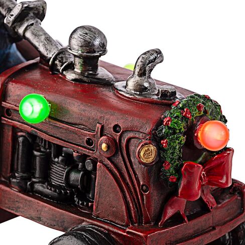 شركة Alpine Corporation 9 بوصة ارتفاع رجل ثلج بوليستون على زينة عطلة الجرار مع أضواء LED متغيرة الألوان، زينة عيد الميلاد in Kuwait