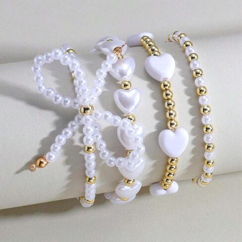 Pearl Bow Bracelet for Women Waterproof Gold Beaded Bracelets Stretch Bead Ball Stackable Bracelets Adjustable Multilayered Elastic Heart Pearl Bracelets Christmas Bow Bracelet for Women Gifts in Saudi Arabia