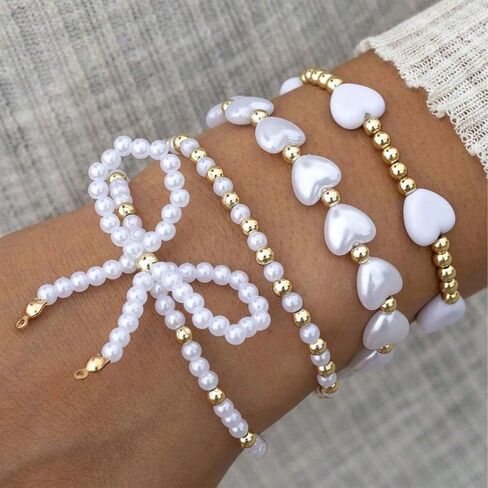 Pearl Bow Bracelet for Women Waterproof Gold Beaded Bracelets Stretch Bead Ball Stackable Bracelets Adjustable Multilayered Elastic Heart Pearl Bracelets Christmas Bow Bracelet for Women Gifts in Saudi Arabia