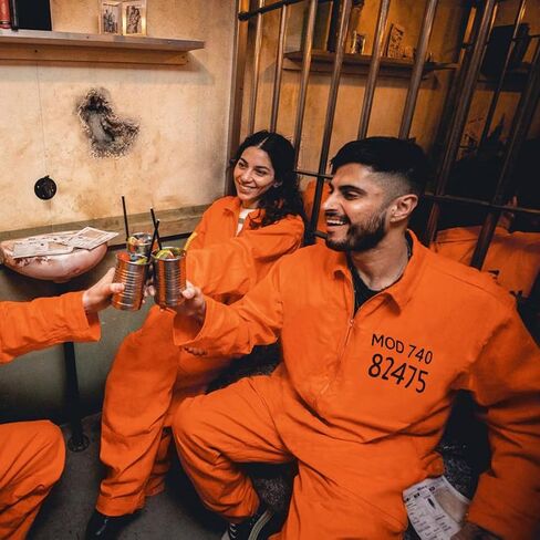 L'VOW Orange Prison Costume Adult Prisoner Jumpsuit Jail Inmate Uniform Women Men in Saudi Arabia