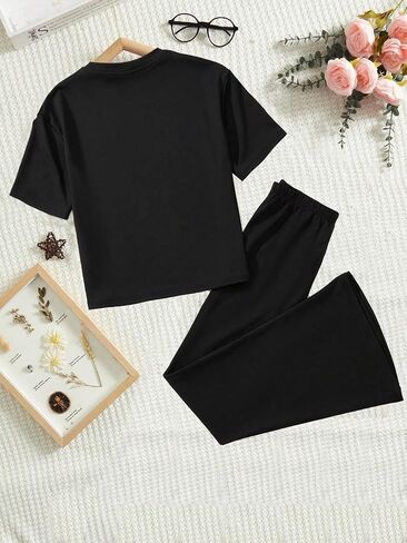 SweatyRocks Girl's Two Piece Outfits Heart Graphic Short Sleeve T Shirts and Flared Pants Sets in Saudi Arabia