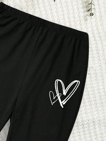 SweatyRocks Girl's Two Piece Outfits Heart Graphic Short Sleeve T Shirts and Flared Pants Sets in Saudi Arabia