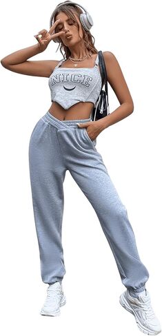 بنطال رياضي نسائي من SweatyRocks غير متماثل بخصر مطاطي عالي الخصر، بنطال رياضي للركض مع جيوب in Saudi Arabia