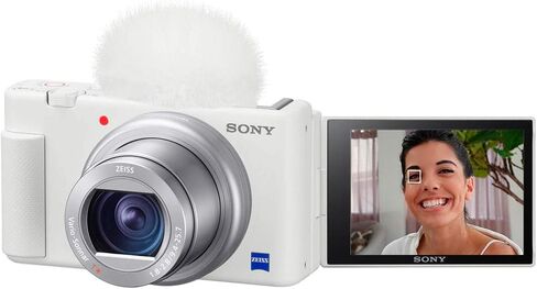 كاميرا فيديو Sony ZV-1 مدمجة لمدونات الفيديو الرقمية بدقة 4K HDR لمنشئي المحتوى ومدوني الفيديو، حزمة DCZV1/W بيضاء مع حزمة حماية ممتدة لمدة عامين من CPS + حقيبة Deco Gear + مجموعة بطاقات وملحقات سعة 128 جيجابايت in Saudi Arabia