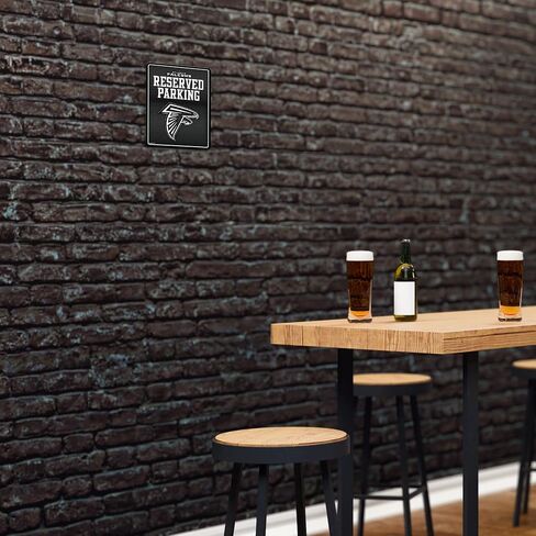 Rico Industries NFL لكرة القدم من ألياف الكربون مقاس 8.5 × 11 بوصة من ألياف الكربون المعدنية لوقوف السيارات - رائعة لكهف الرجال، وغرفة النوم، والمكتب، وديكور المنزل in Kuwait