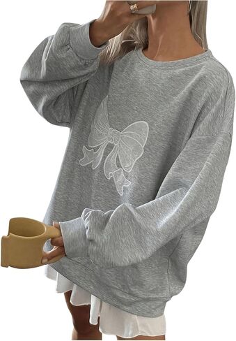 SHENHE Women's Graphic Oversized Bow Print Crew Neck Loose Sweatshirt Casual Pullover Top in Saudi Arabia