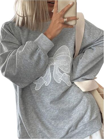 SHENHE Women's Graphic Oversized Bow Print Crew Neck Loose Sweatshirt Casual Pullover Top in Saudi Arabia