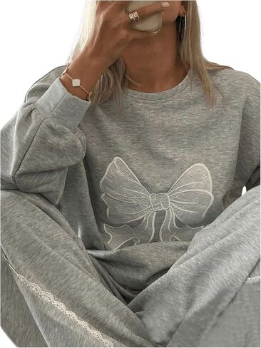 SHENHE Women's Graphic Oversized Bow Print Crew Neck Loose Sweatshirt Casual Pullover Top in Saudi Arabia