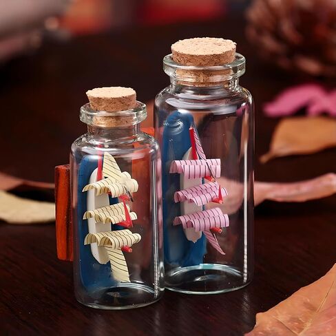NVAAV 12 Pack 40ml Mini Bottles, Small Glass Bottles Jars with Cork Caps, Wish Bottles, Message Bottles for Wedding Favors and Art Crafts DIY Decoration(1.35 Oz, 1.18" x 3.14") in Saudi Arabia