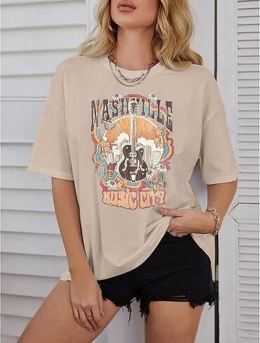 ناشفيل ميوزيك سيتي تي شيرت نسائي موسيقى الريف قمصان كبيرة الحجم لفرقة الروك تي شيرت عتيق بأجنحة الجيتار تي شيرت جرافيك in Kuwait