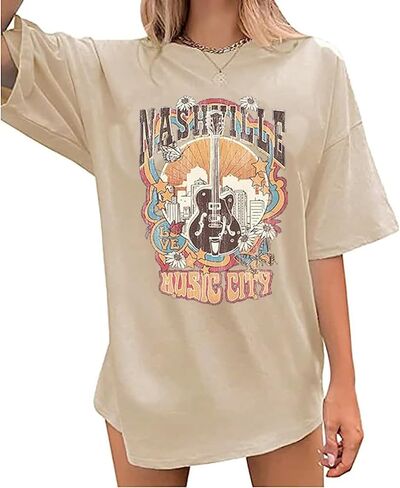 ناشفيل ميوزيك سيتي تي شيرت نسائي موسيقى الريف قمصان كبيرة الحجم لفرقة الروك تي شيرت عتيق بأجنحة الجيتار تي شيرت جرافيك in Kuwait
