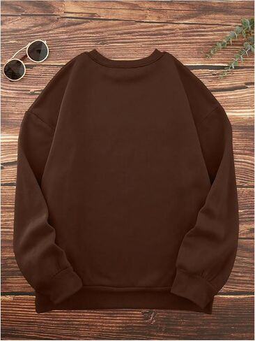 كنزة صوفية نسائية بمقاس كبير مع أحرف جرافيك بياقة دائرية وكتف منسدل وأكمام طويلة in Saudi Arabia