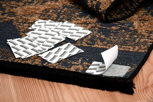 16 PCS Non-Slip Rug Pads for Hardwood Floors and Tiles, Double-Sided Reusable Rug Grippers, Anti-Curling Carpet Tape to Keep Corners Flat, Easy to Apply & Washable Adhesive Stickers in Saudi Arabia