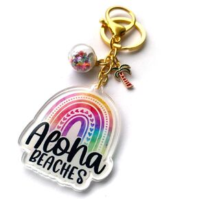 سلسلة مفاتيح Aloha Beaches من Adore By Nat - حلقة مفاتيح سحرية من الأكريليك مصنوعة يدويًا على شكل قوس قزح استوائي في جزيرة هاواي