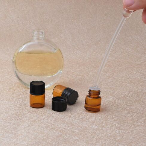Enslz 100 Pcs Essential Oil Glass Bottles Mini Tiny Refillable Empty Aromatherapy Perfume Liquid Amber Glass Bottles (1ml) … in Saudi Arabia
